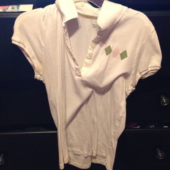 White polo with green and pink diamonds