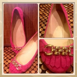 Pink suede Aldo flats.