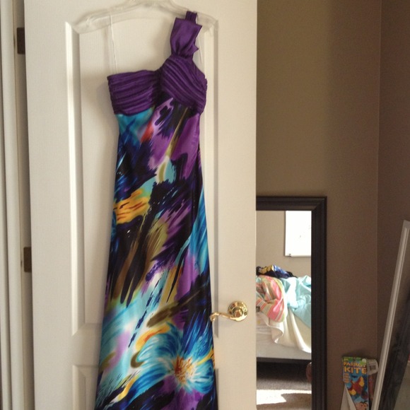 Floor length multi colored dress.