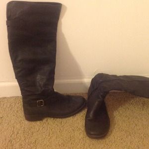 Knee length black riding boots