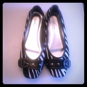 Never been worn Zebra flats. Super comfy!