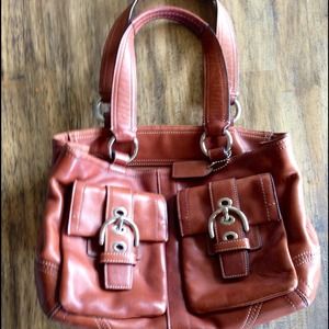 Couch purse. Given as a gift and barely carried.