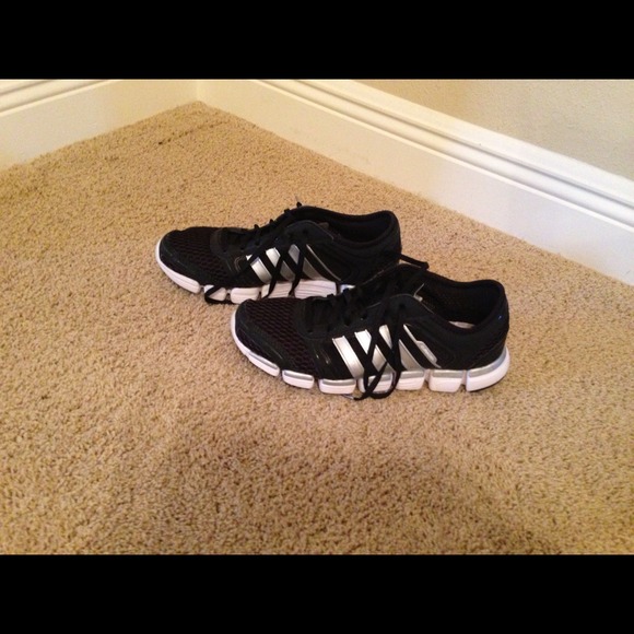 Black Adidas athletic shoes
