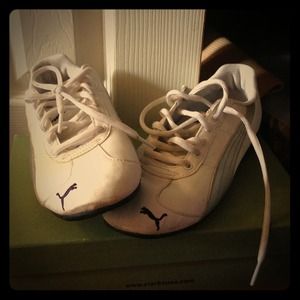 White and silver puma sneakers! worn only once.