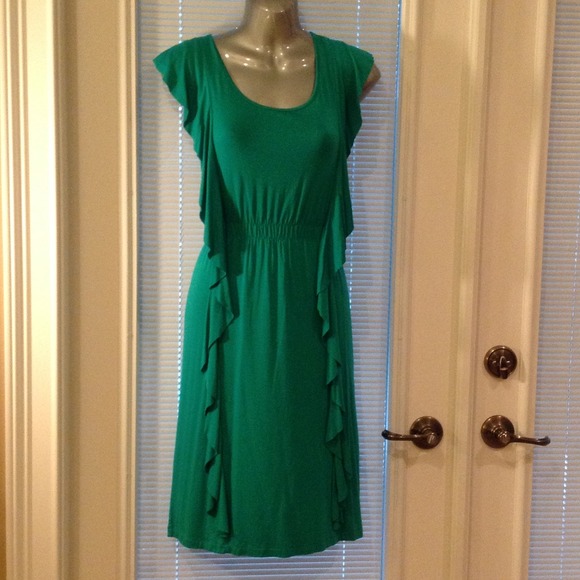 Green knit dress with ruffles