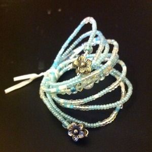 Unique handmade pastel blue beaded wire hair wrap.