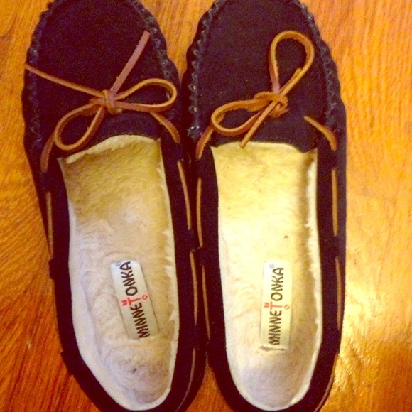 Navy MinneTonka moccasins with brown laces :)