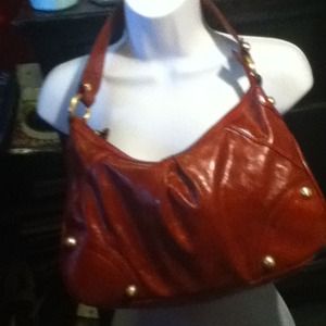 Red faux leather purse
