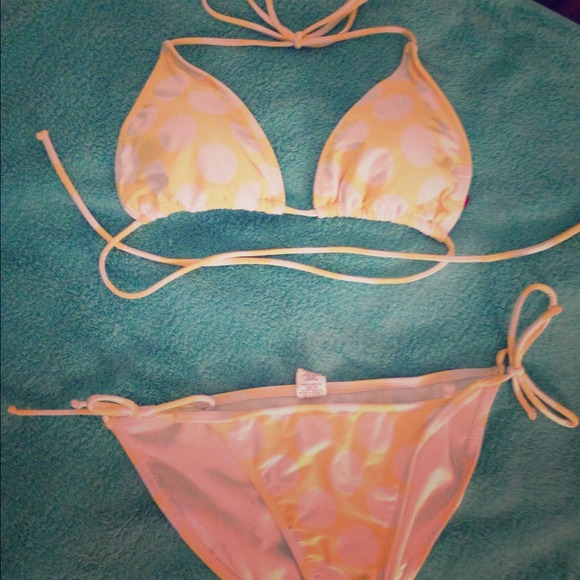 Yellow and white polka dot string bikini