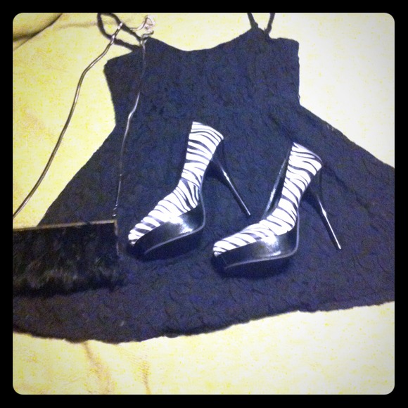 Sold! Black and white zebra print 5 inch heels.