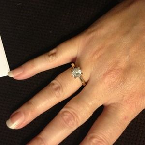 Gold tone CZ ring-engagement ring look.