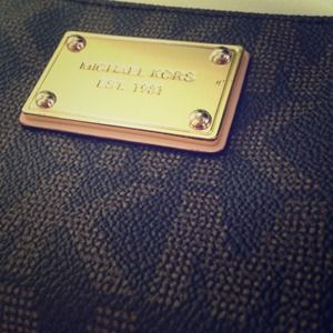 Leather Michael Kors monogram wristlet