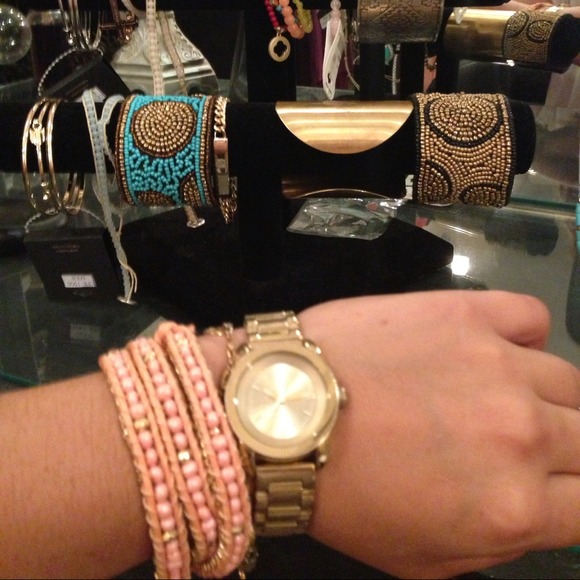 Pink and gold wrist wrap bracelet