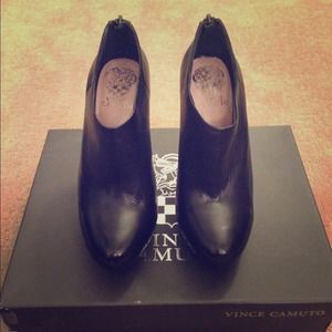 Vince Camuto black zip booties