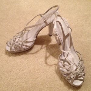 Silver embellished Nine West strappy heels.