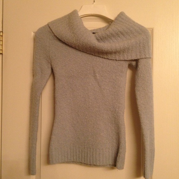 Light blue sweater .