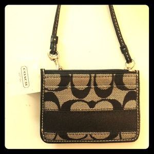 Authentic brand new Coach wristlet