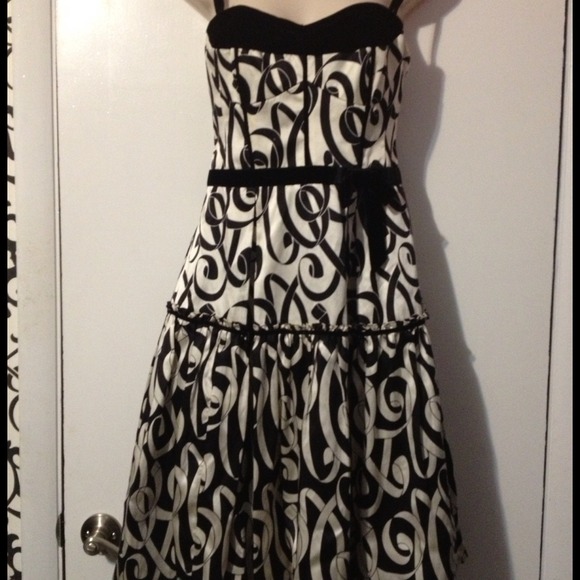 Silky layered dress with velvet bow and accents
