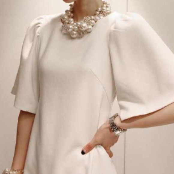 Brand new White round neck short-sleeved dress.