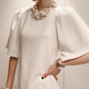 Brand new White round neck short-sleeved dress.