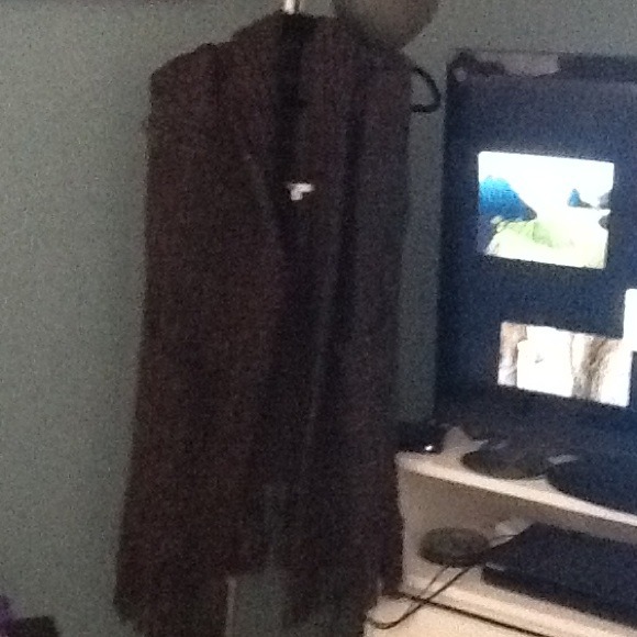 Long, fringed, sleeveless, sweater vest