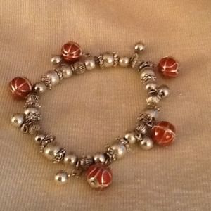 Bracelet. Earrings, pin. Sold