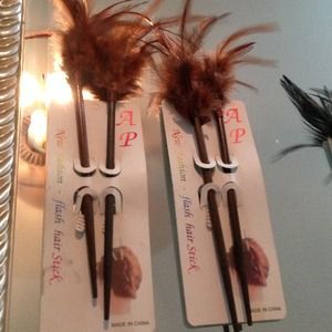 $5each or 2 for&8...Feather hair accessories.