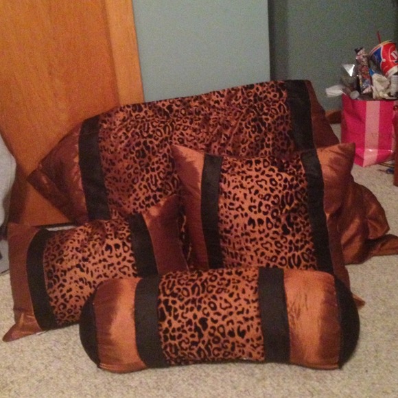 3 leopard print pillows plus one pillow sham!