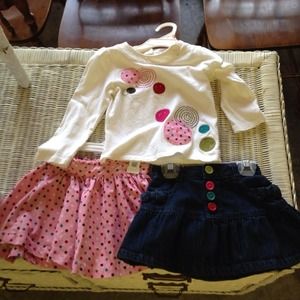 1 jean skirt, pink polka dot skirt and shirt