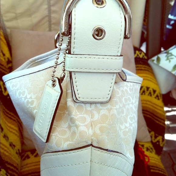 New condition coach purse