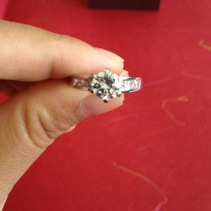 A set of 1-ct Genuine Sliver wedding rings.