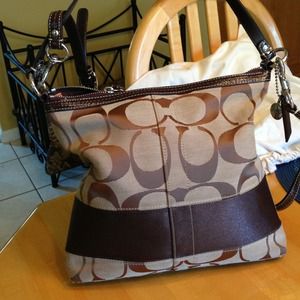 Brown coach handbag 10'' by 11'm , worn only twice