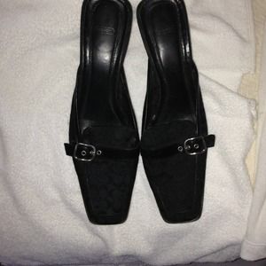 Authentic Coach Black Mules with Silver Hardware.