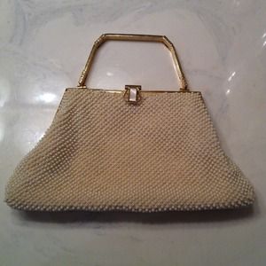 Beautiful Vintage Pearl ivory purse gold accents!