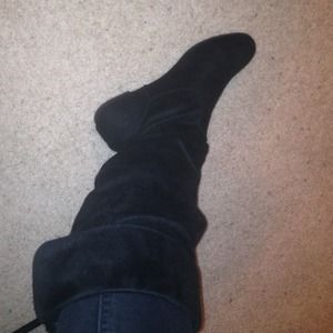Tall black suede boots