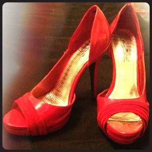 Red platform pumps size 8.5