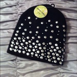 Knit cap with silver studs on front
