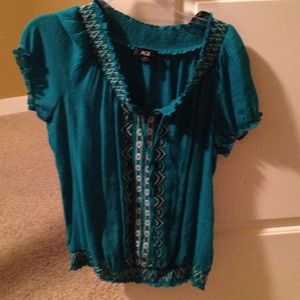 Dark teal color blouse