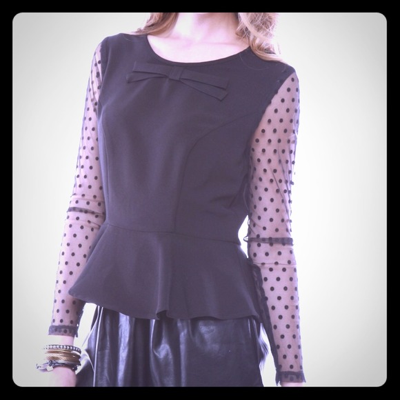 Black peplum top with mesh sleeves
