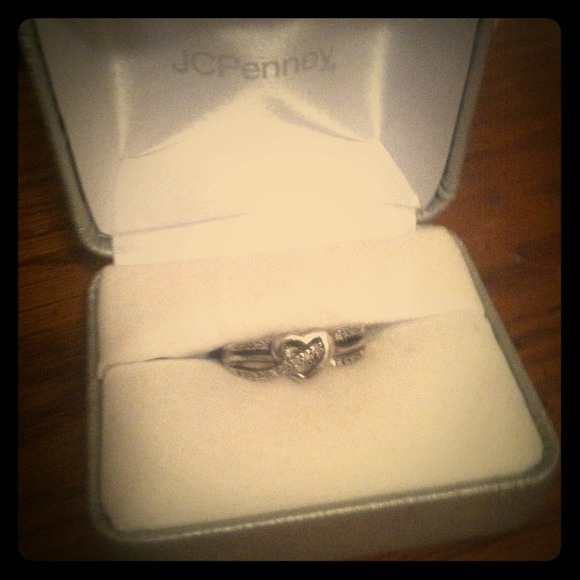 Silver ring with diamond and heart detailing!