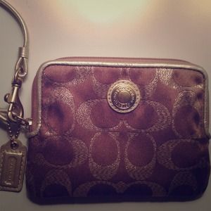 Small bronze/gold Coach wristlet