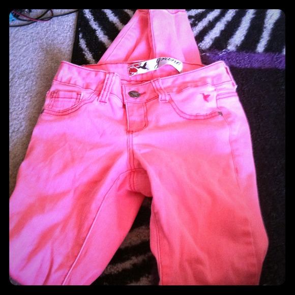 Bright pink skinny jeans