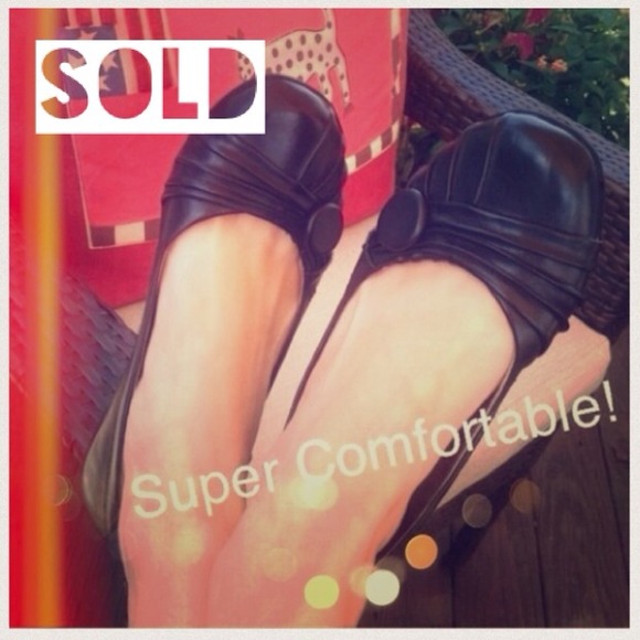 Black leather flats