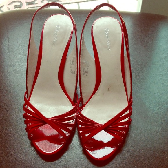 Pair of red Calvin Klein sandal