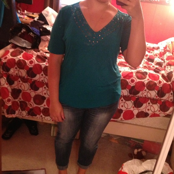 Teal v-neck top with stud design around neckline