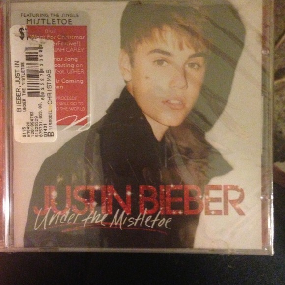 Justin bieber under the mistletoe cd. never opened