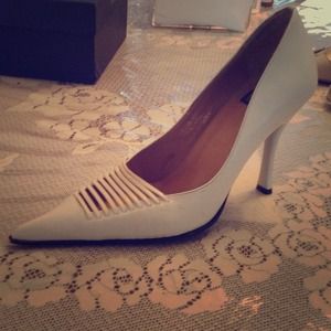 White pointed heel. Never used!