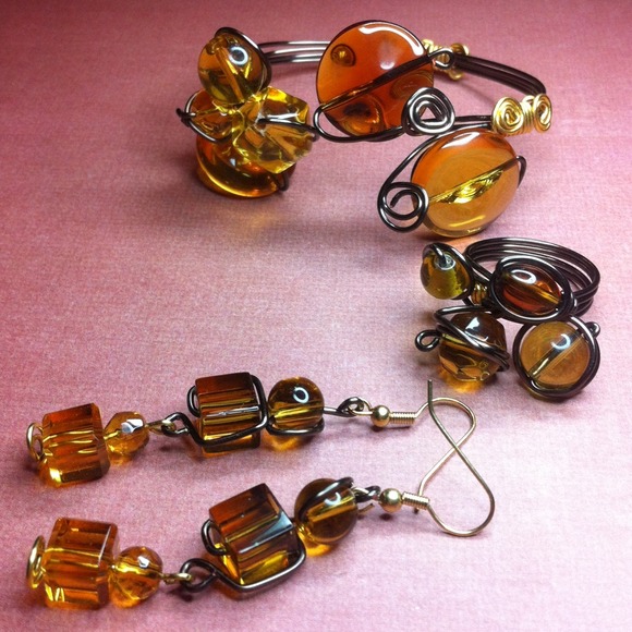 211A.  3 piece amber color stones wire wrapped set
