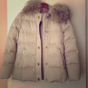 Coach down jacket with coyote fur