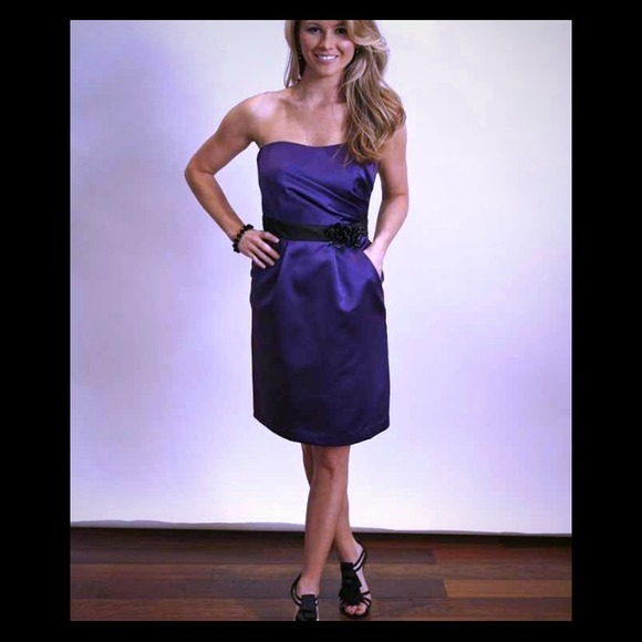 Navy blue tube top knee length dress.